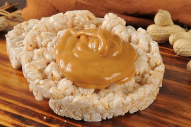 (1) 50 calorie rice cake with 1 teaspoon of approved peanut butter ...